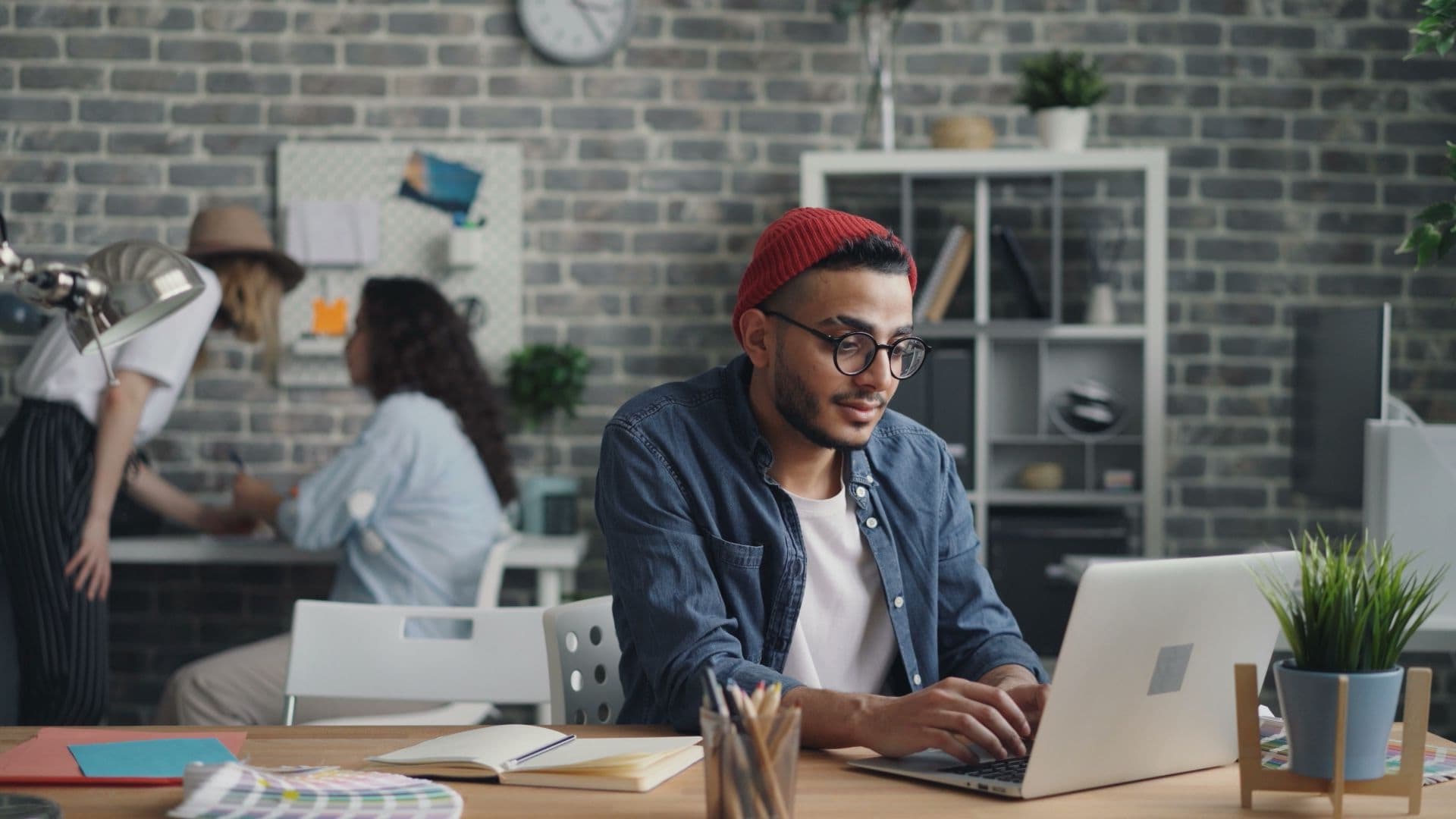 A local entrepreneur at work in a collaborative workspace